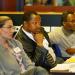  Dr. Carol Spreen (U.S.A.), Dr. Mokaeane Victor Polaki (Lesotho) and Mr. Meshak Moloi (South Africa) in deep concentration during a conference session.